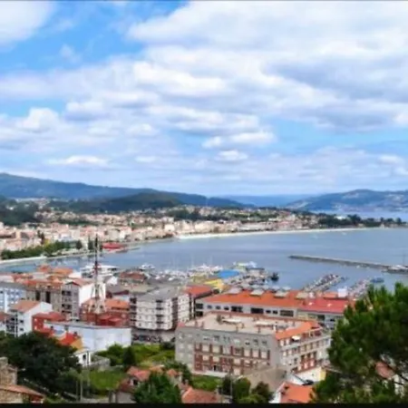 Atico En La Playa De Cangas Extérieur photo